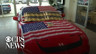 Ford dealer offers buyers a Bible, flag and a $400 gun with new car purchase