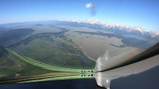 Landing on RWY 19 at KJAC in a Challenger 300 cockpit view.