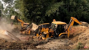 Three JCB Backhoe 3DX Machine Throwing Out Broken Bridge Concrete