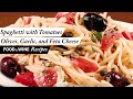 Spaghetti with Tomatoes, Black Olives, Garlic, and Feta Cheese | Food & Wine Recipes