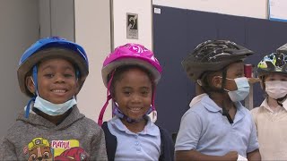 Warrensville Heights students receive bicycle helmets from Amazon