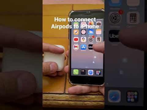 Video: Kako povezati iWorld Bluetooth slušalice?