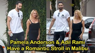 Pamela Anderson & Adil Rami Have A Romantic Stroll In Malibu