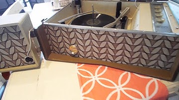 Silvertone stereo record player playing a 78 RPM record