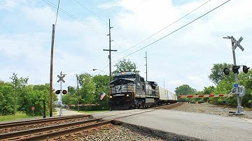 NS Dash 8 zooms through millbury while heading west w/ a small Intermodal Train