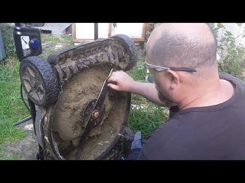 Sharpening lawnmower blade with a dremel.