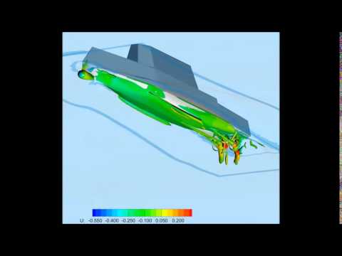 Vortices around Self-Propelled ONR Tumblehome during Turning Circle Maneuver in Waves