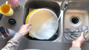Point of view video model washing dishes