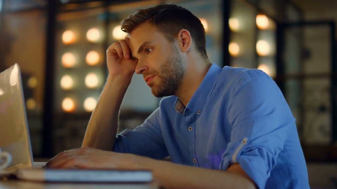 Focused Businessman typing on laptop at office, Tired man | Free Stock Footage 4K | No Watermark