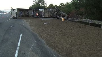 Big rig carrying 27 tons of concrete sand overturns on Bay Area highway