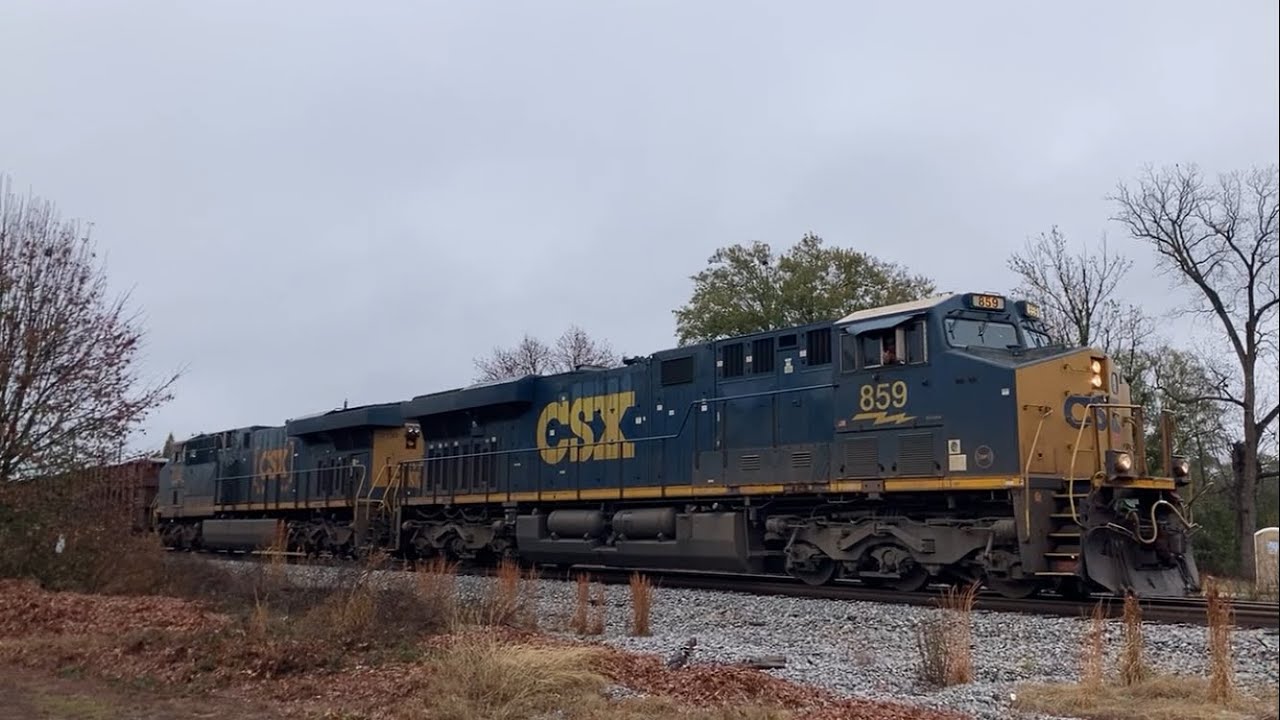 Southbound CSX ballast train goes through West Point GA. 12/5/2025 11:35 AM
