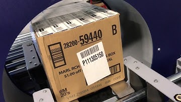 Compacta 6 SPR wrapping box full of cigarette cartons by Robopac USA