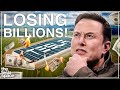 Why Elon Musk Says The Gigafactorys Are Losing BILLIONS!