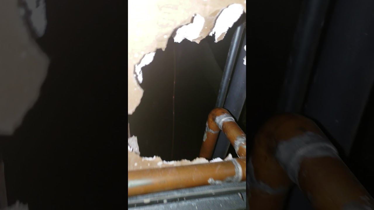 Pinhole in copper pipe in wall