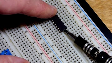 How to safely remove an integrated circuit IC from a breadboard using a small screwdriver