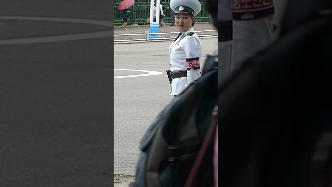 North Korean Traffic Lady Spots A Friend And Breaks Character Humans Northkorea Pyongyang