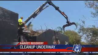 Brush crews clearing out tree limbs and storm debris