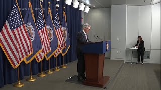 Fed Raises Key Rate But Hints It May Pause