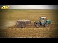 Тракторы Т-150К, VALTRA T193 и погрузчик К-701 вносят известь на поле