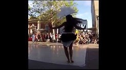 A Polynesian dancer performing in public.