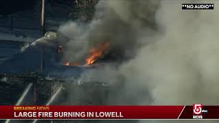 Large fire burning in Lowell