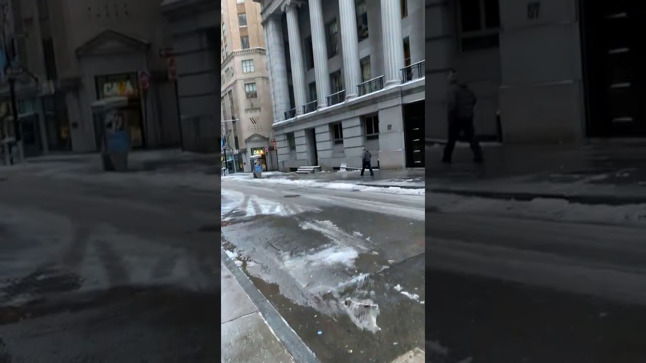 Misty Blanco finishes her meeting with one of her lawyers Jelani James on Wall St.