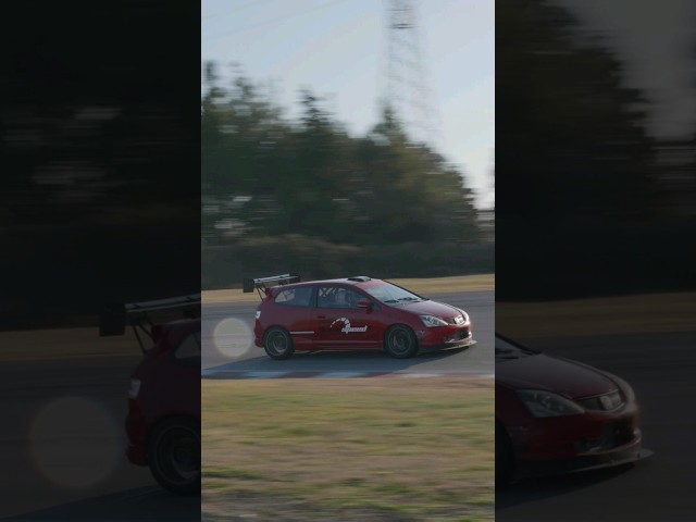 Revving down the track, feeling every curve and acceleration in our Honda Civic Type-R EP3.