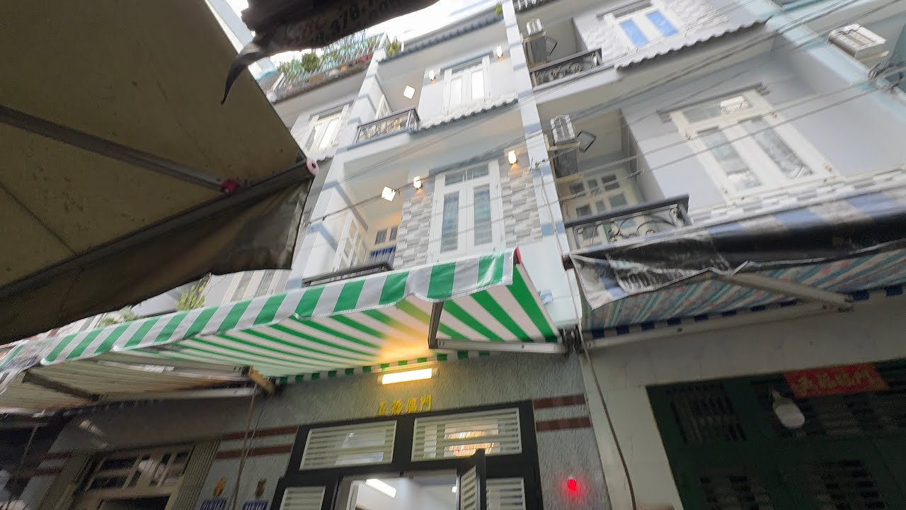 Nhà 2ty25 nhà 4 tầng hẻm ô tô gần chợ gần trường học #0933797979 