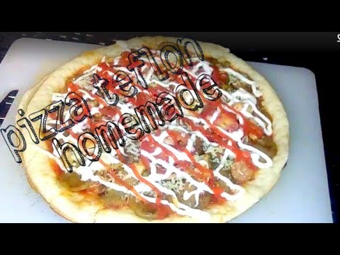 Video: Cara Membuat Pizza Dengan Kemangi, Bawang Putih Dan Keju