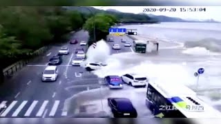 High tide waves sweep away vehicles on road in E. China