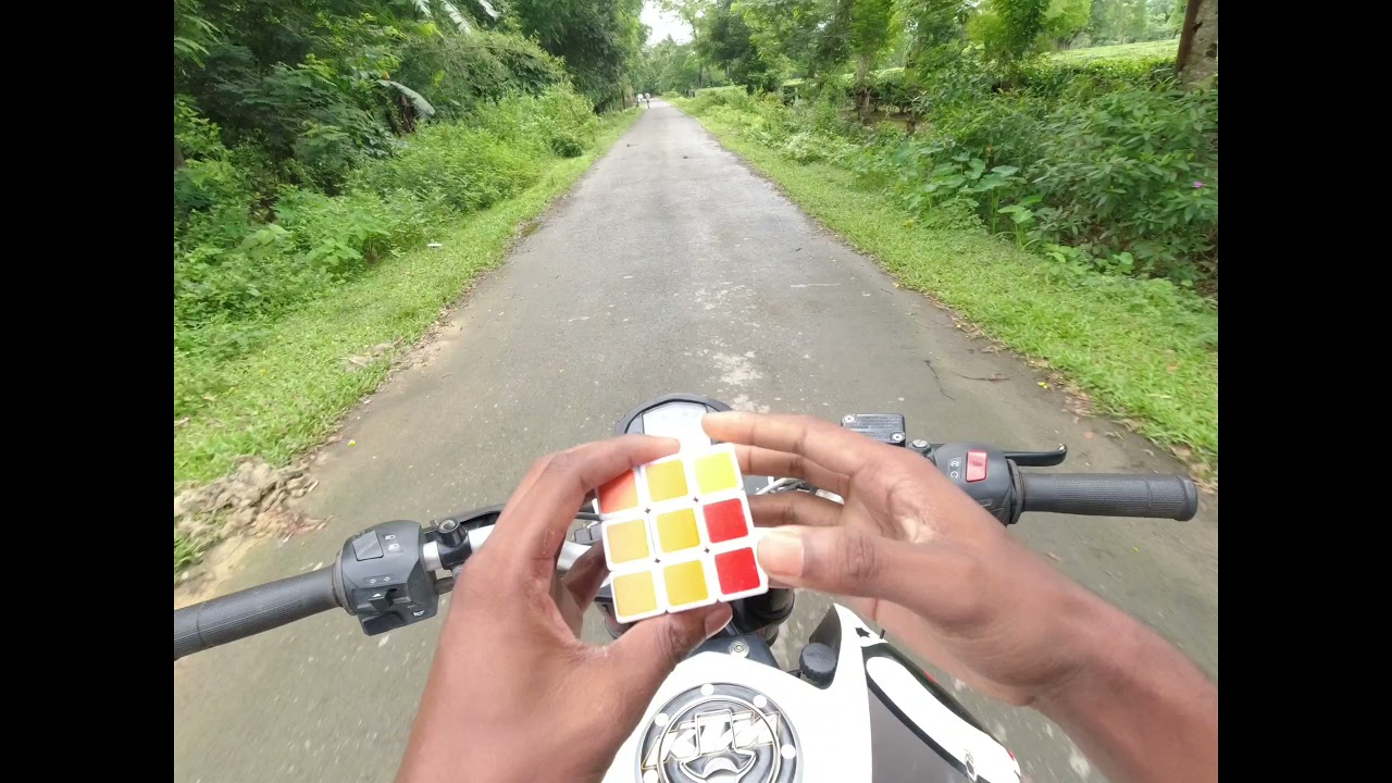 solving rubik's cube  in bike.  