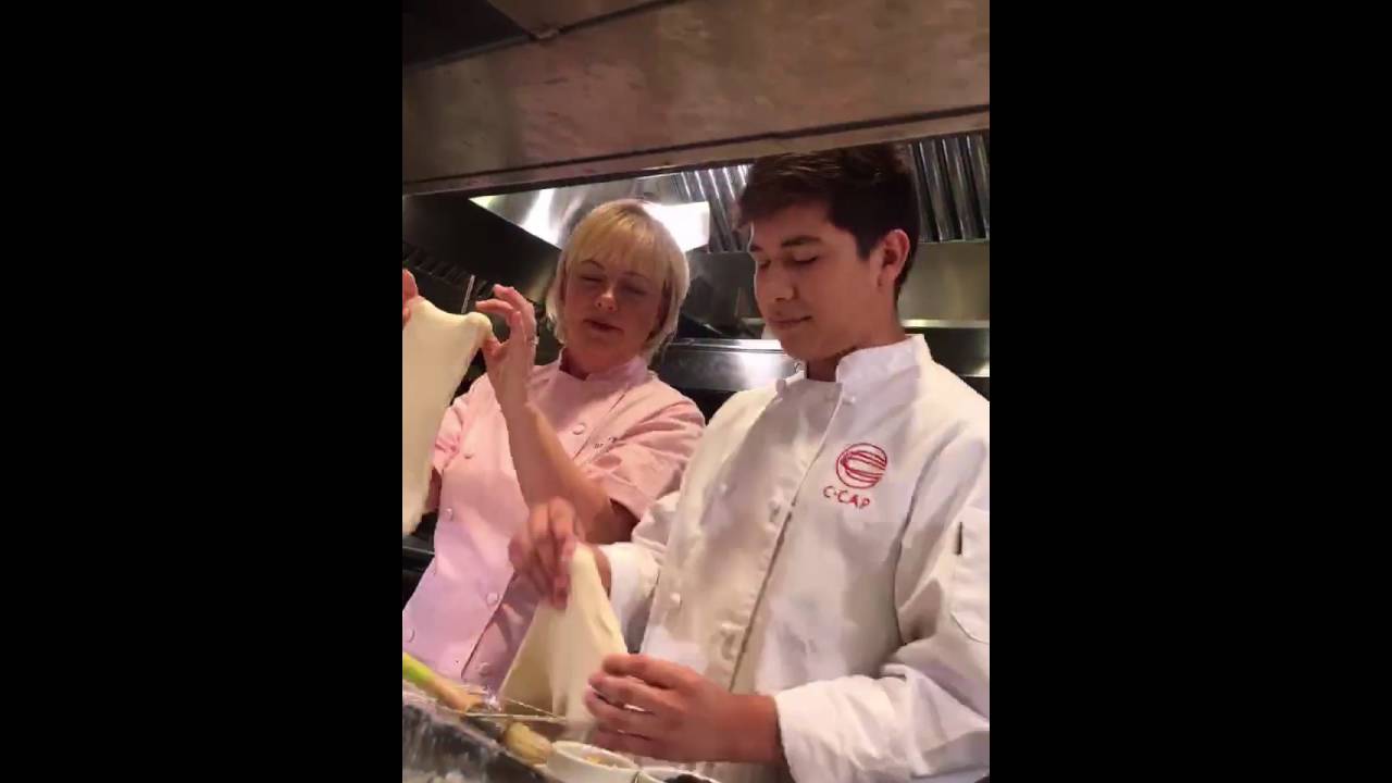 Chef Sherry Yard teaching C-CAPer Brian Orozco her pastry tricks!