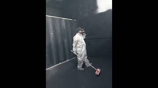 Spraying the walls in my shop black