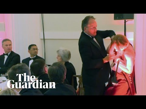 Conservative MP Mark Field grabs climate protester by the neck