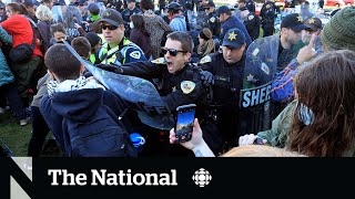 U.S. campuses see clashes, arrests as Canadian encampments grow by CBC News: The National 11,068 views 21 hours ago 9 minutes, 32 seconds