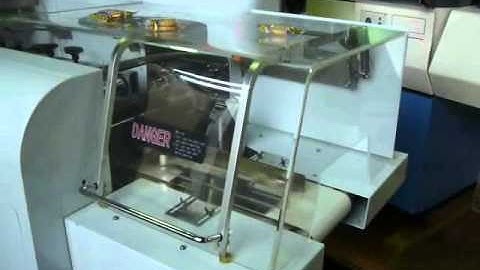 IOPAK Flow Wrapper with Auto Infeed System Running Twin-Pack Biscuits between 160 - 200 packs/min