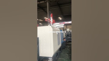 Plastic injection molding machine with servo motor test with robot arm