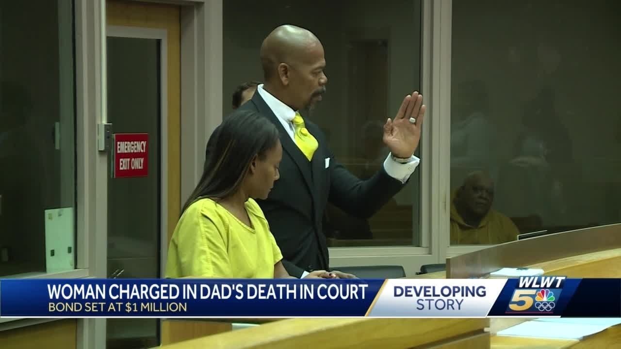 Woman accused of killing father for his home, appears in court - YouTube