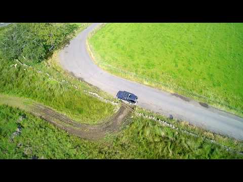 Yuneec Typhoon Q500 4k Quadcopter chasing car in follow me mode.