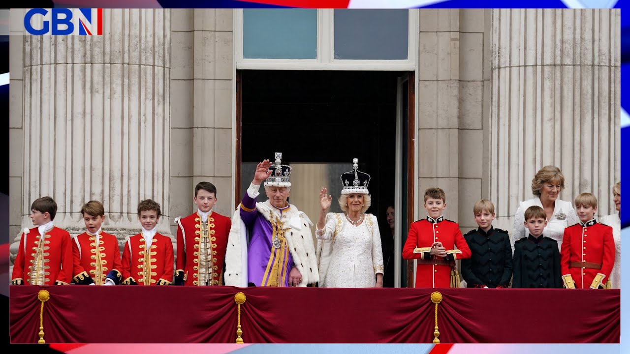 King Charles and Queen Camilla greet members of the public from the Buckingham Palace balcony