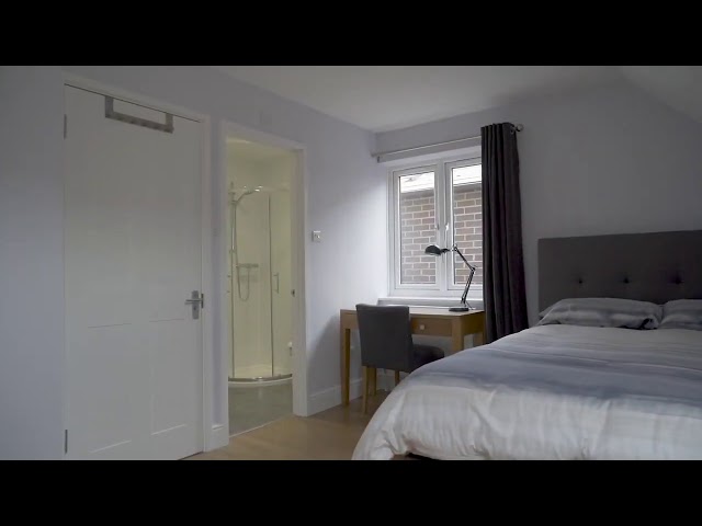 Video 1: Living room with smart TV leading into a private garden 