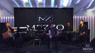 Video thumbnail of "Mezzo band  live. Spain"