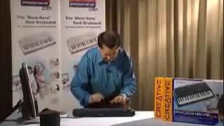 Asian Guy Plays Drums On A Keyboard