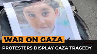 Protesters in Germany display images of killed Palestinian children in Gaza | AJ #shorts screenshot 3