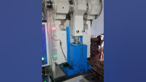 Induction wad punching machine