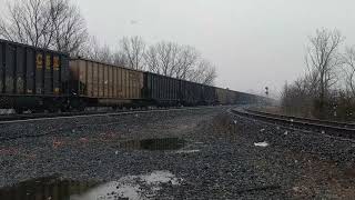 CSX westbound empty coal hoppers moving fast over the Big 4 Bridge