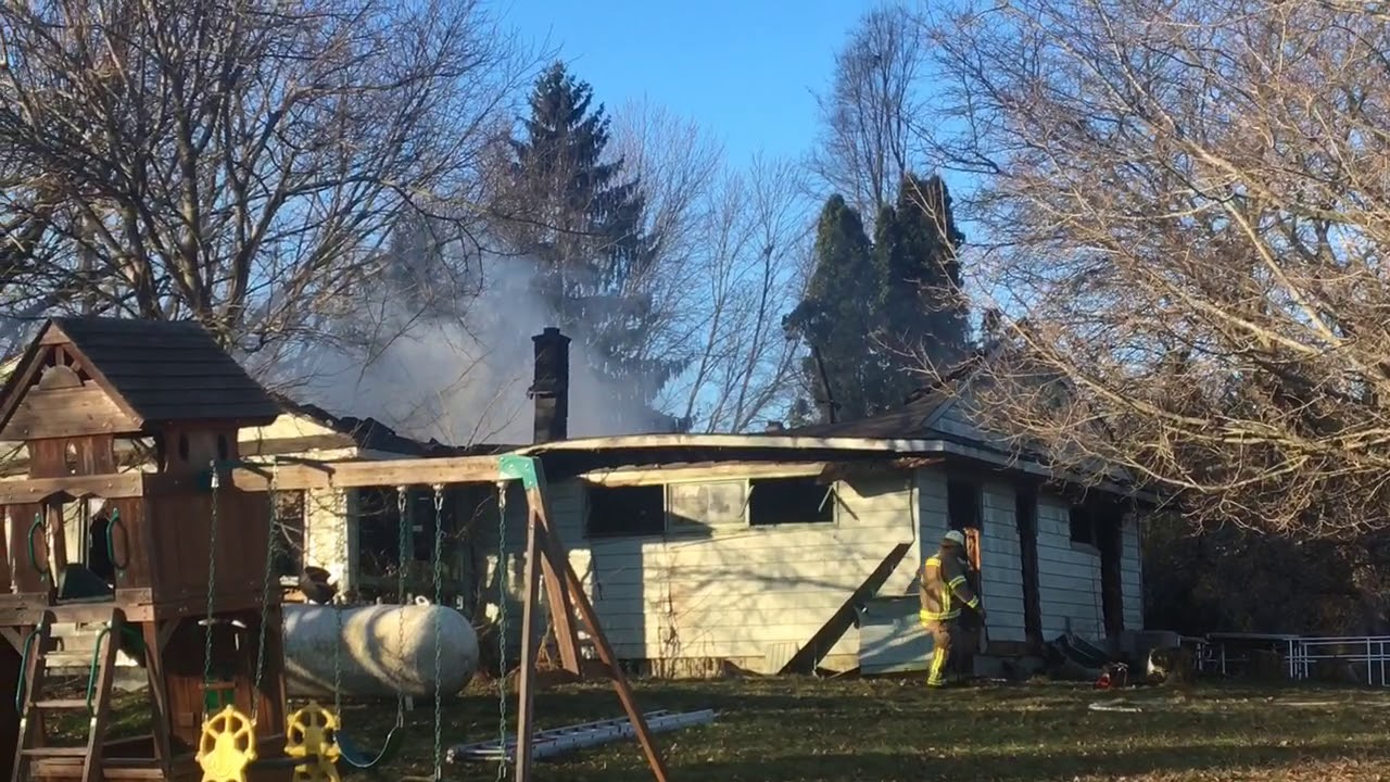 Firefighters battle house fire on G Ave - YouTube