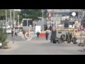 Elderly woman stabbed and Palestinian shot dead as Middle East violence rages