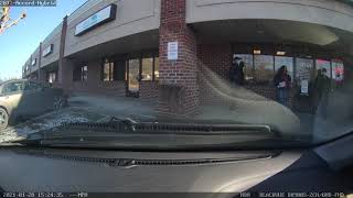 Front #2 Pickup Truck with Trailer drives wrong way in strip mall.