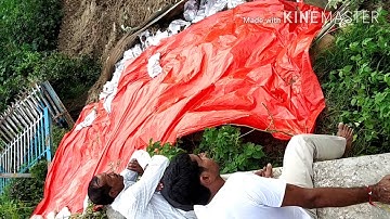 Bridge abutment soil cutting due to heavy Rail. Soil slope protection work by using cement bags.